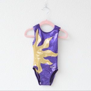 Girls purple and gold gymnastics leotard